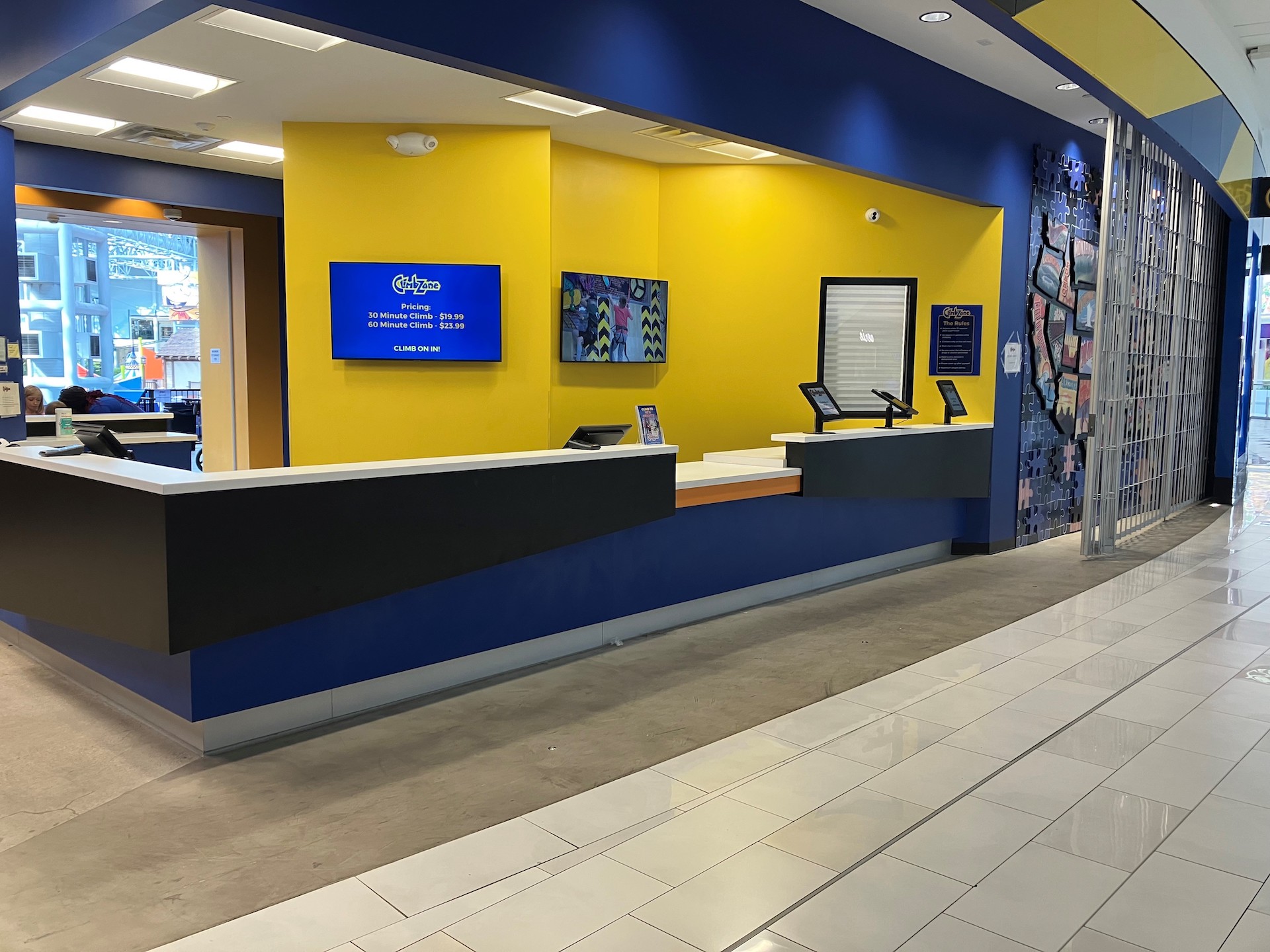 A custom blue and yellow reception area in a recreation center.